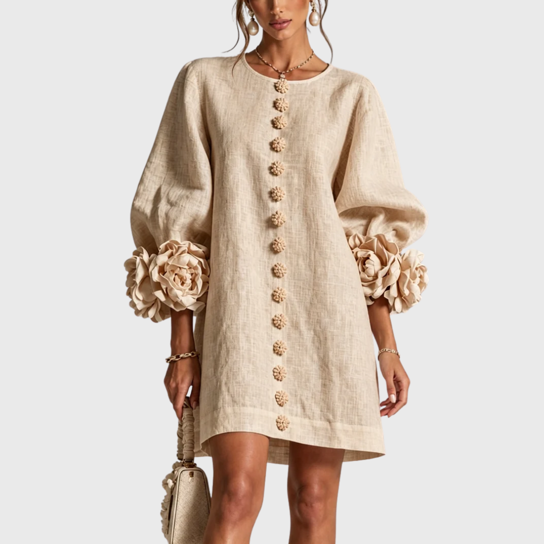 Light beige linen mini dress with puff sleeves and flower buttons, front view.