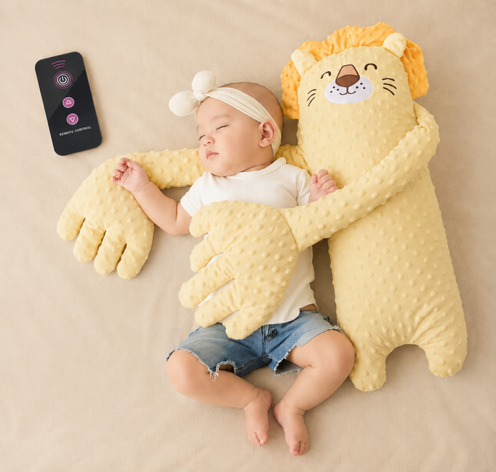 Sleeping baby in a headband and denim shorts held by the long arms of a yellow plush lion, with a black remote beside. 7