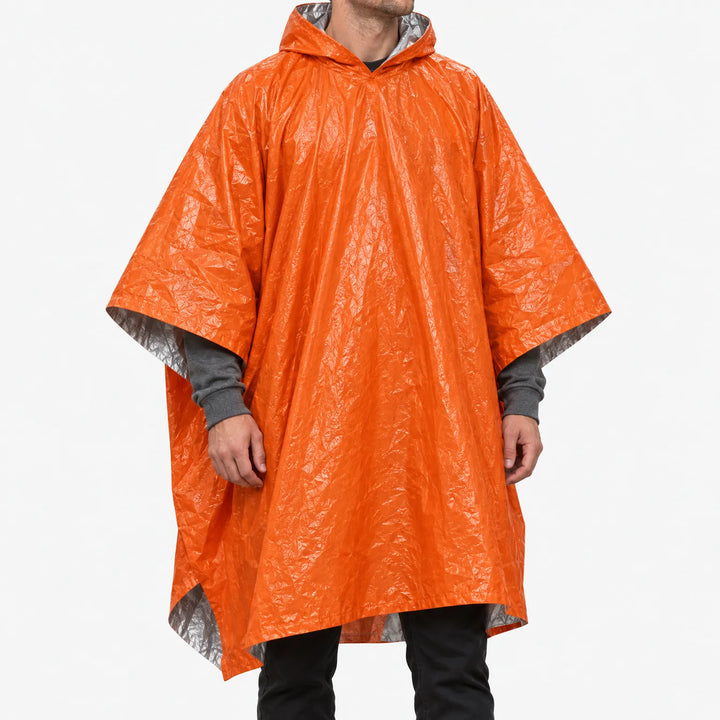 Man in the hooded orange poncho, front view against a white backdrop, with the silver lining visible at the hem and sleeves. 2