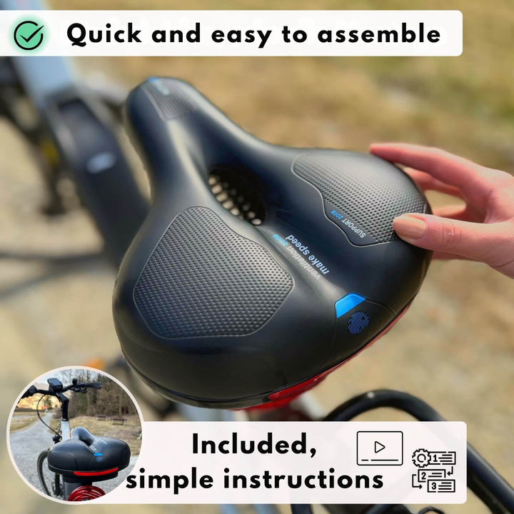 Another view of the black saddle with blue accents beside a bike frame.