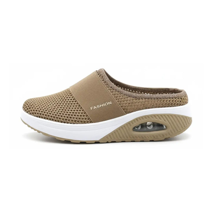 Side view of a single khaki brown mesh mule showing the strap, white midsole and air cushion heel.
