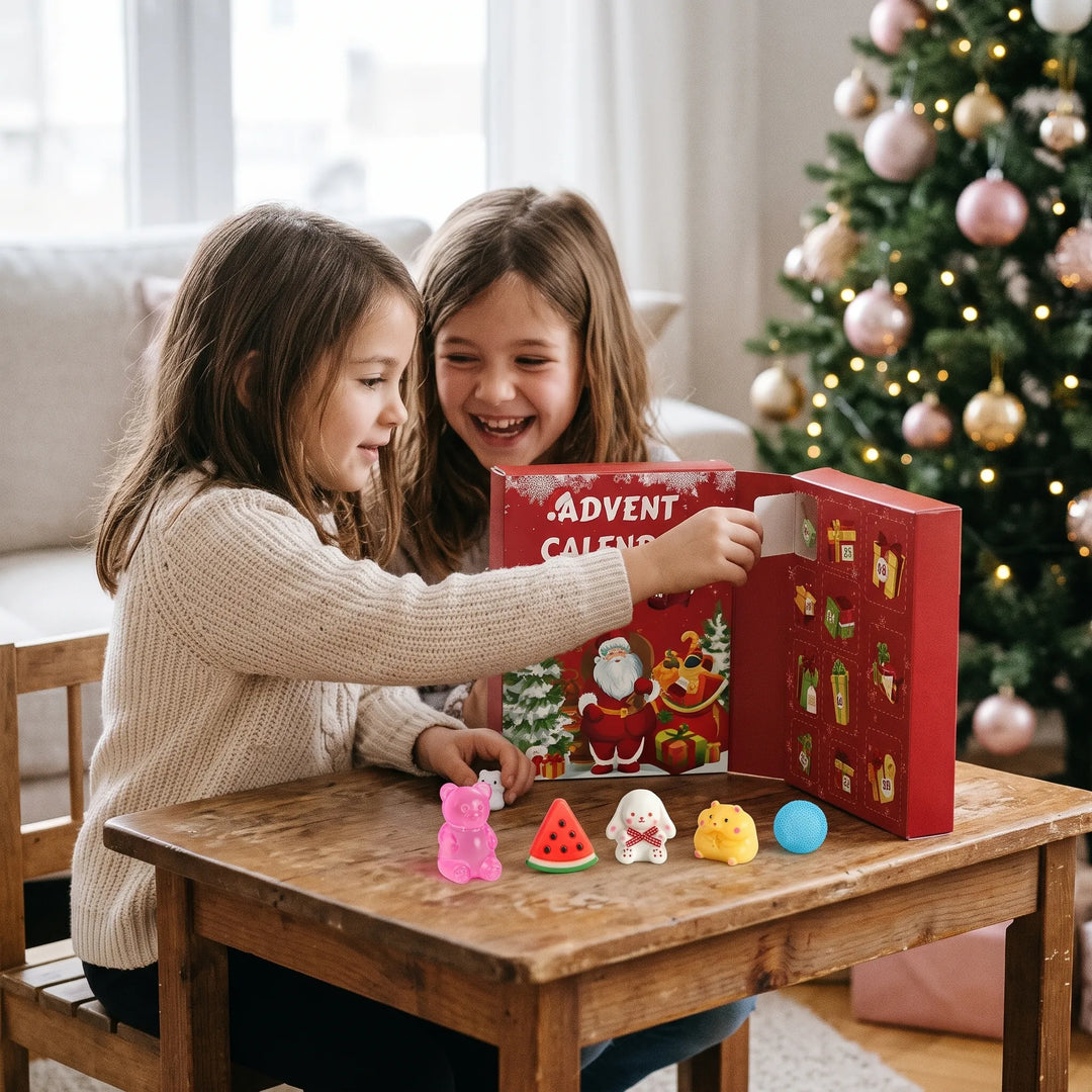Two smiling girls open a door on a red holiday calendar beside a Christmas tree 1