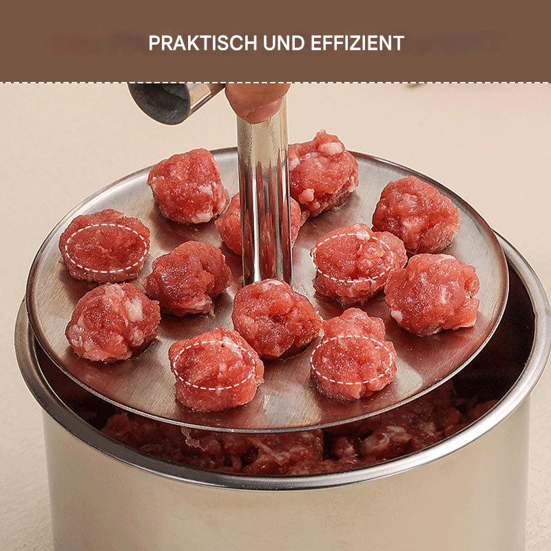 Detail of a hand pressing the T-handle plate down inside the steel cup with evenly formed raw meatballs. 2