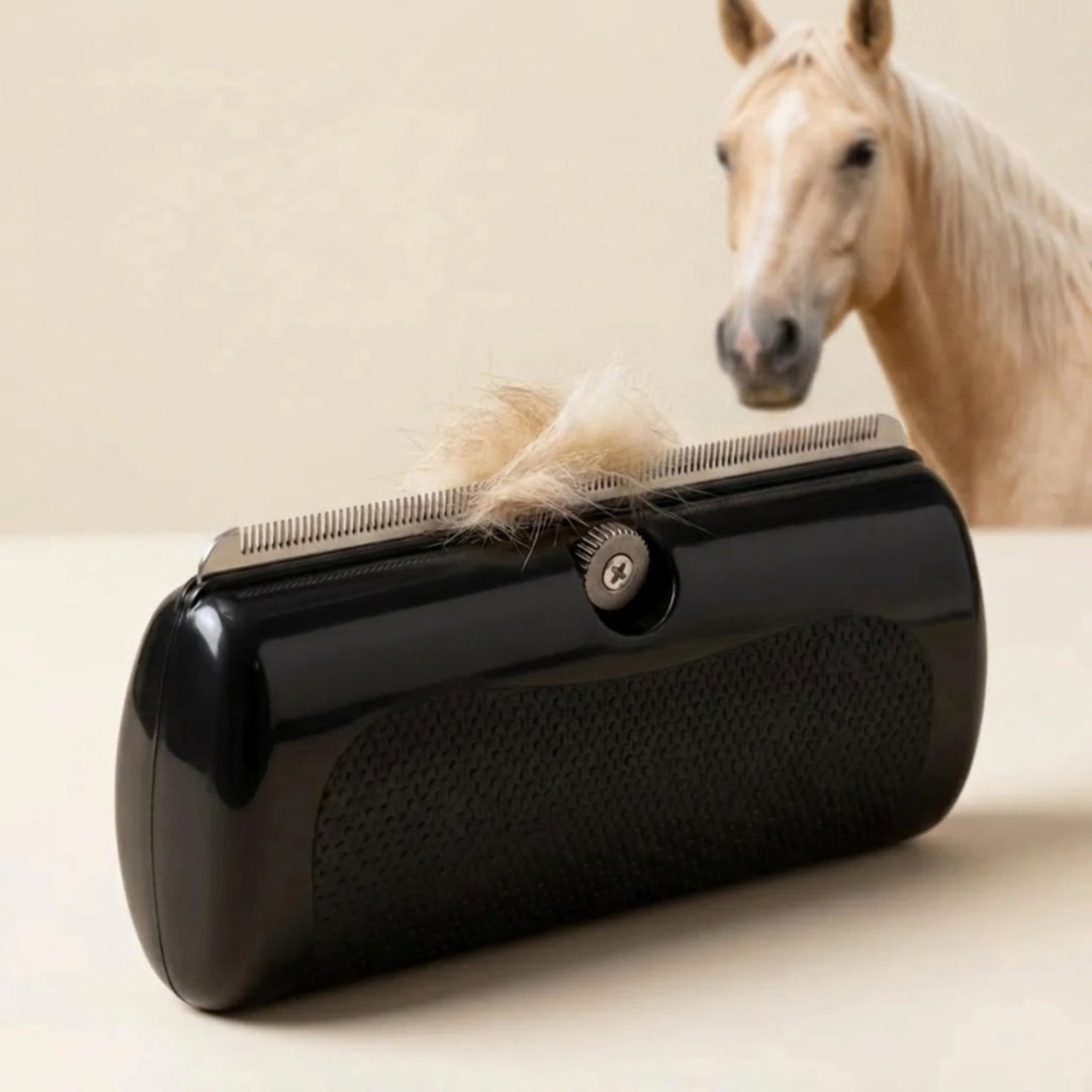 Black handheld horse grooming brush with a steel toothed edge and a tuft of pale horse hair.