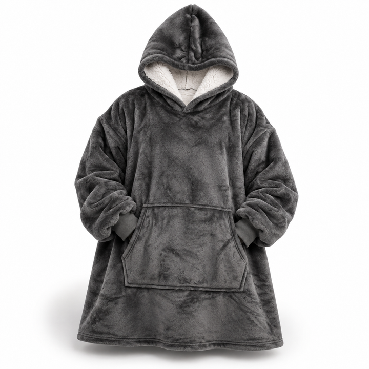 Grey oversized hoodie blanket shown flat from the front, with a white sherpa-lined hood, ribbed cuffs and a large front pocket.