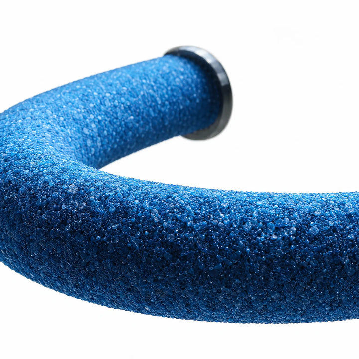 Close-up of the blue perch's coarse, gritty surface curving toward its dark metal end washer, shown against white. 4