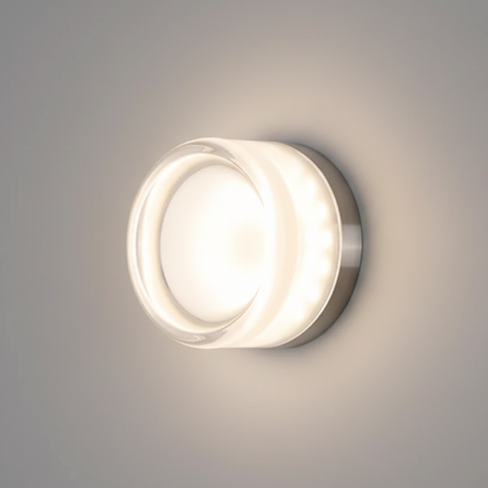 Wall-mounted round lamp with clear glass edge and bright white glow, with tiny LED dots visible along the side. 27
