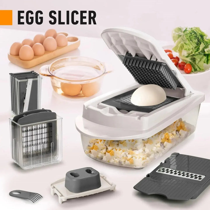 Vegetable cutter detail showing hard-boiled egg dicing into the clear container with blades, holders and cleaning fork.