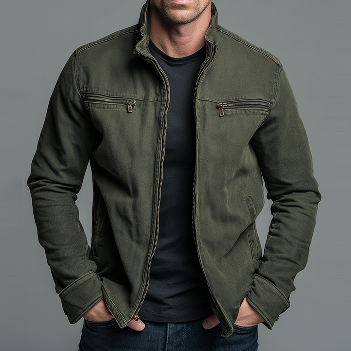 Men's olive green zip-up jacket worn open over a black tee, front view.