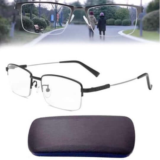 Black half-rim glasses with thin metal temples beside a dark hard case.