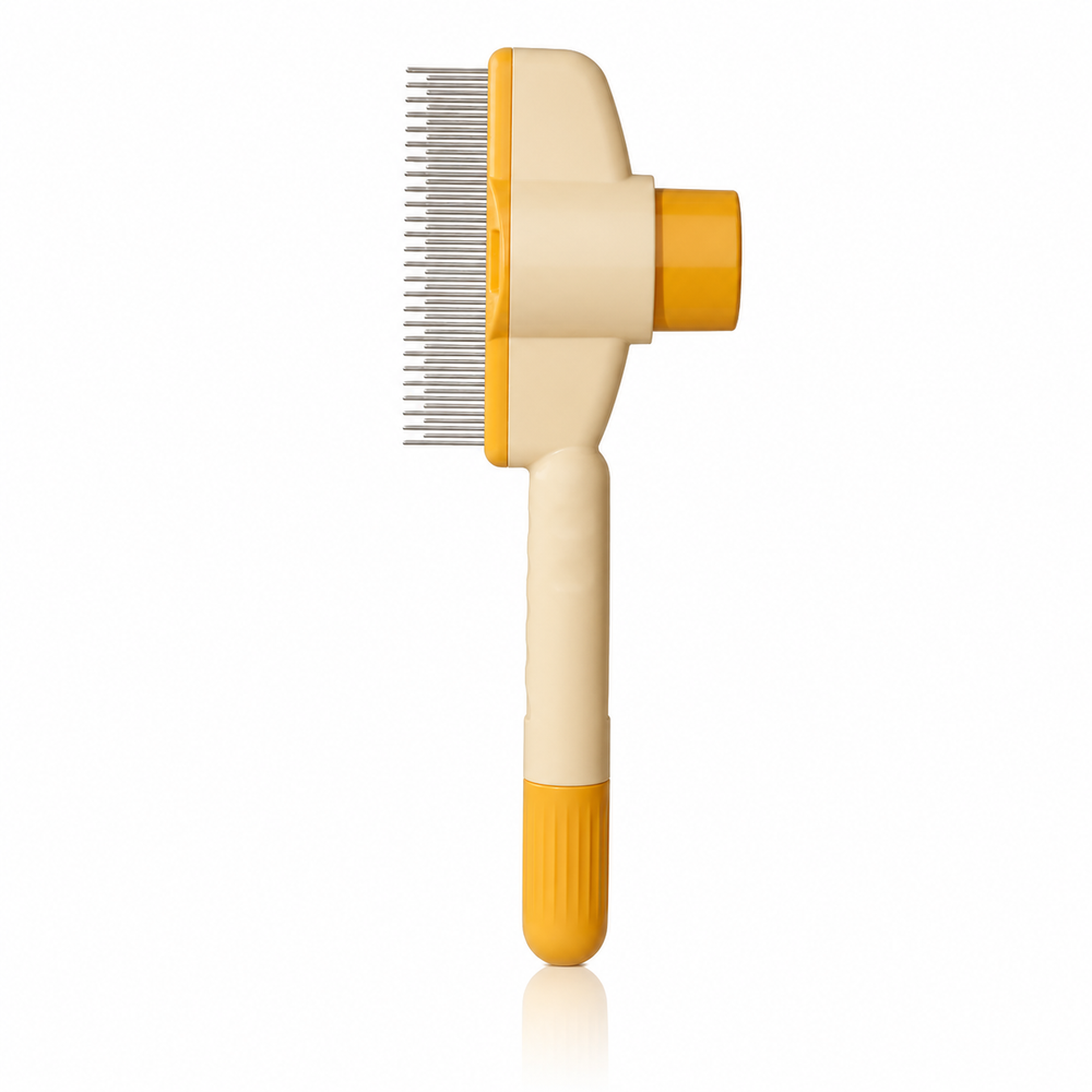 Side view of the cream and yellow comb showing its steel teeth, push button and handle tip.