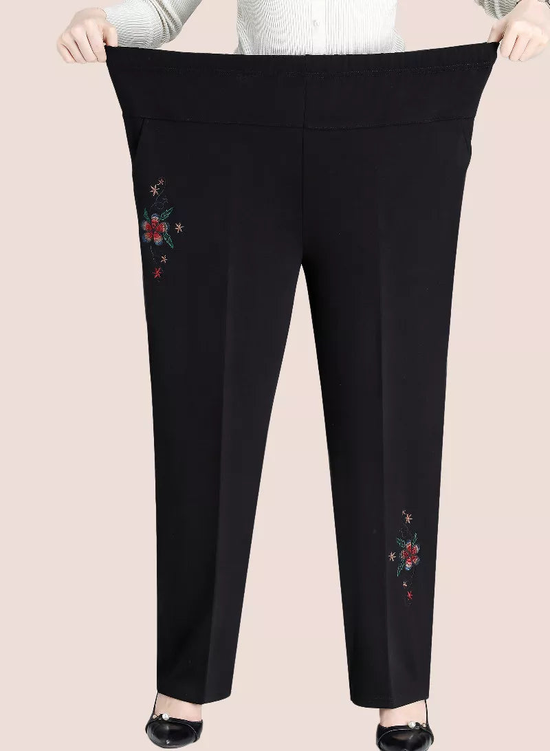 Schwarze Damenhose mit Blumenstickerei, elastischer Bund, elegant, bequem, modisch.