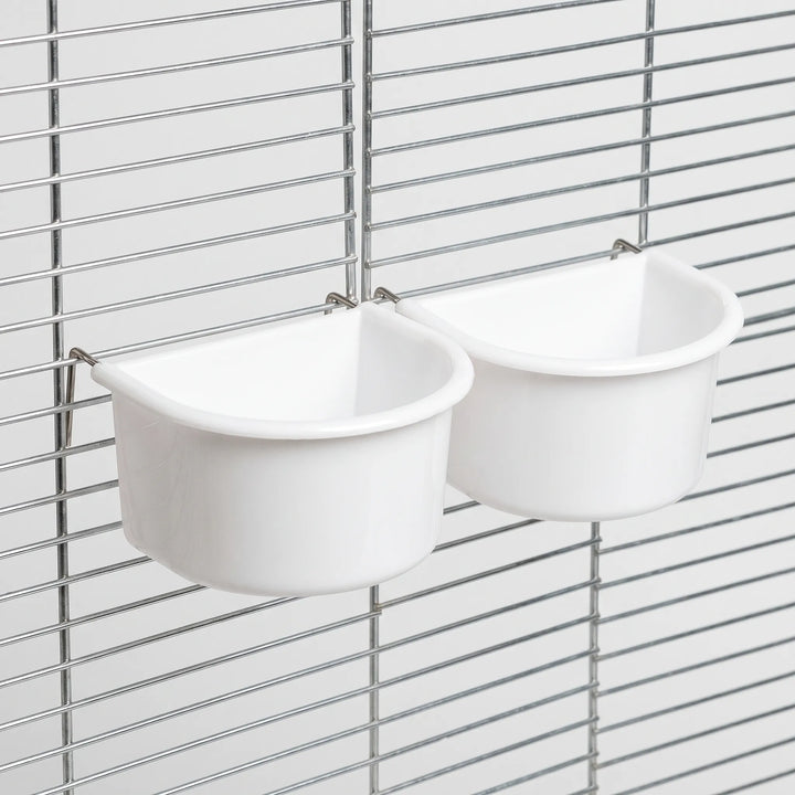 Two white half-round bowls hung on cage bars by thin metal wire hooks, shown at a slight angle. 7