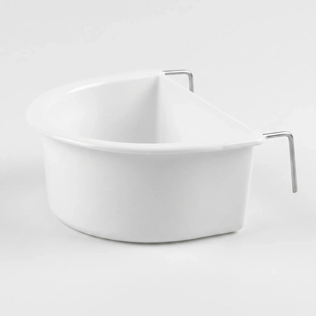 White plastic half-round bowl with two bent metal hooks on its flat side, shown alone against a plain light background. 1