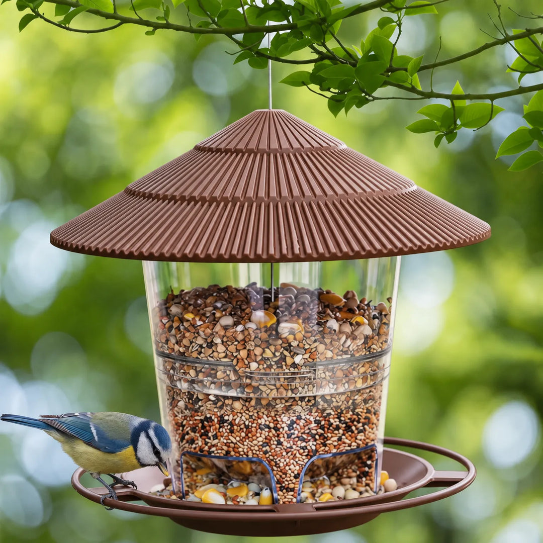 Brown feeder filled with mixed seed, hanging from a leafy branch, with a blue tit perched on the tray rim. 2