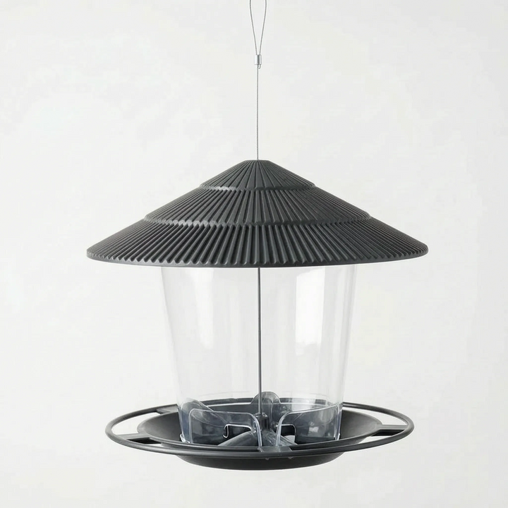 Dark charcoal feeder hanging empty, showing the clear seed tube, inner feeding ports and the ring around the tray. 5