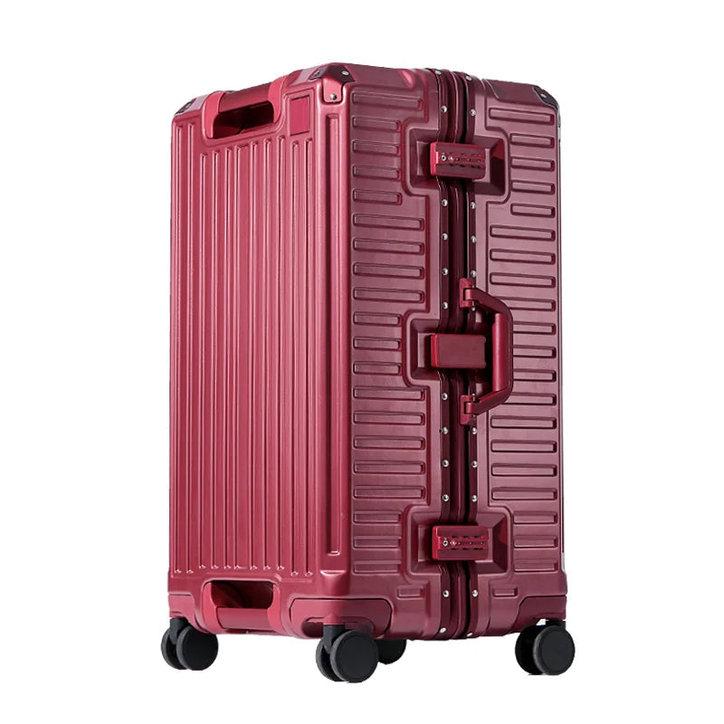 Red ribbed hardshell suitcase with riveted aluminum frame, side handle, two combination locks and four black spinner wheels.