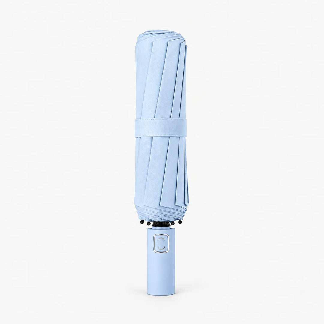 Folded light blue umbrella with a matching fabric strap, standing upright on its handle against a white background. 6