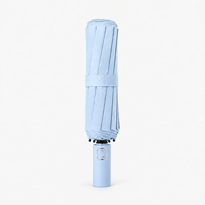 Folded light blue umbrella with a matching fabric strap, standing upright on its handle against a white background. 6