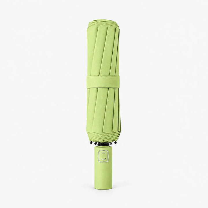 Folded lime green umbrella with matching strap standing upright on its handle against a white background. 8