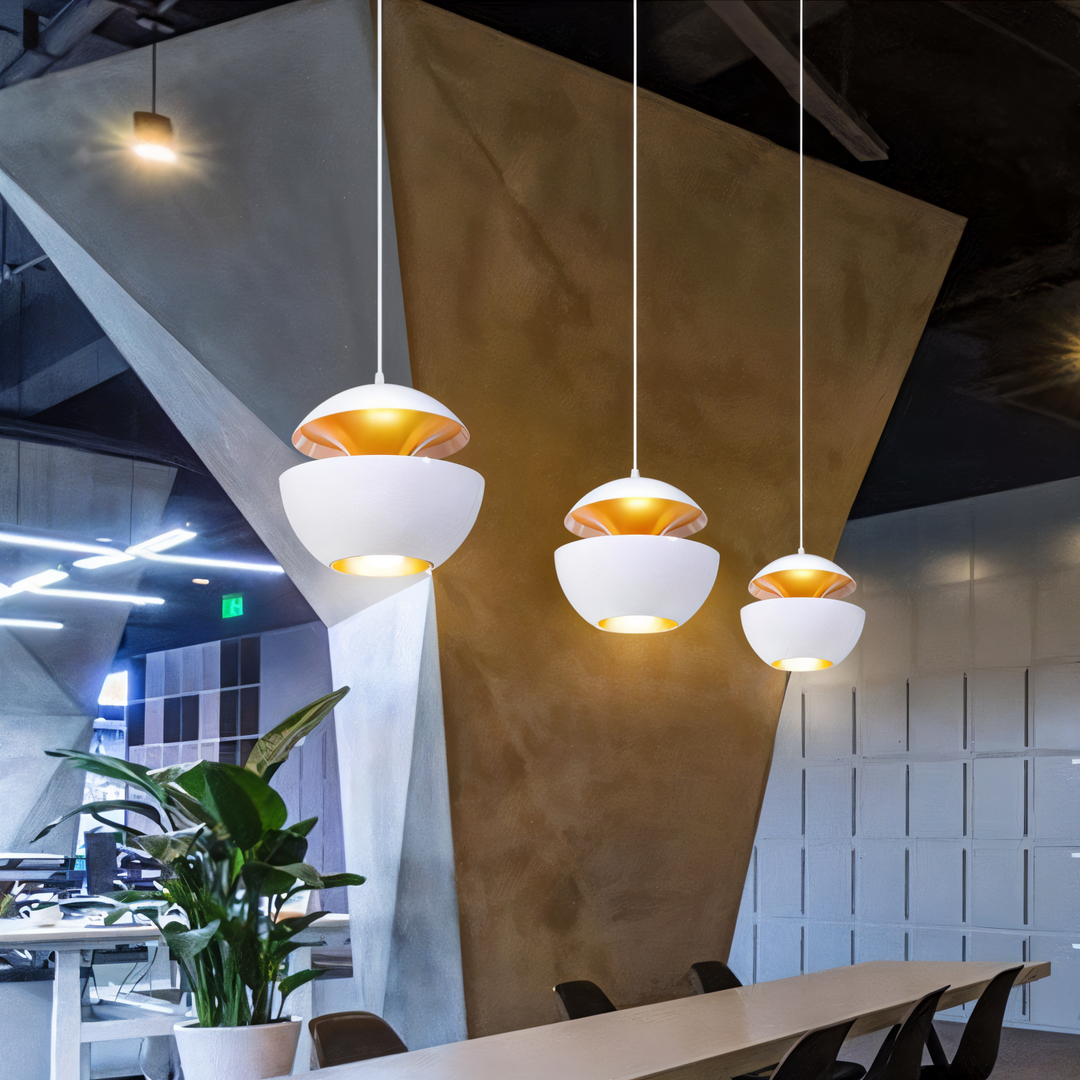 AppleGlow Pendant Light in white metal with gold interiors, shown hanging at different heights.