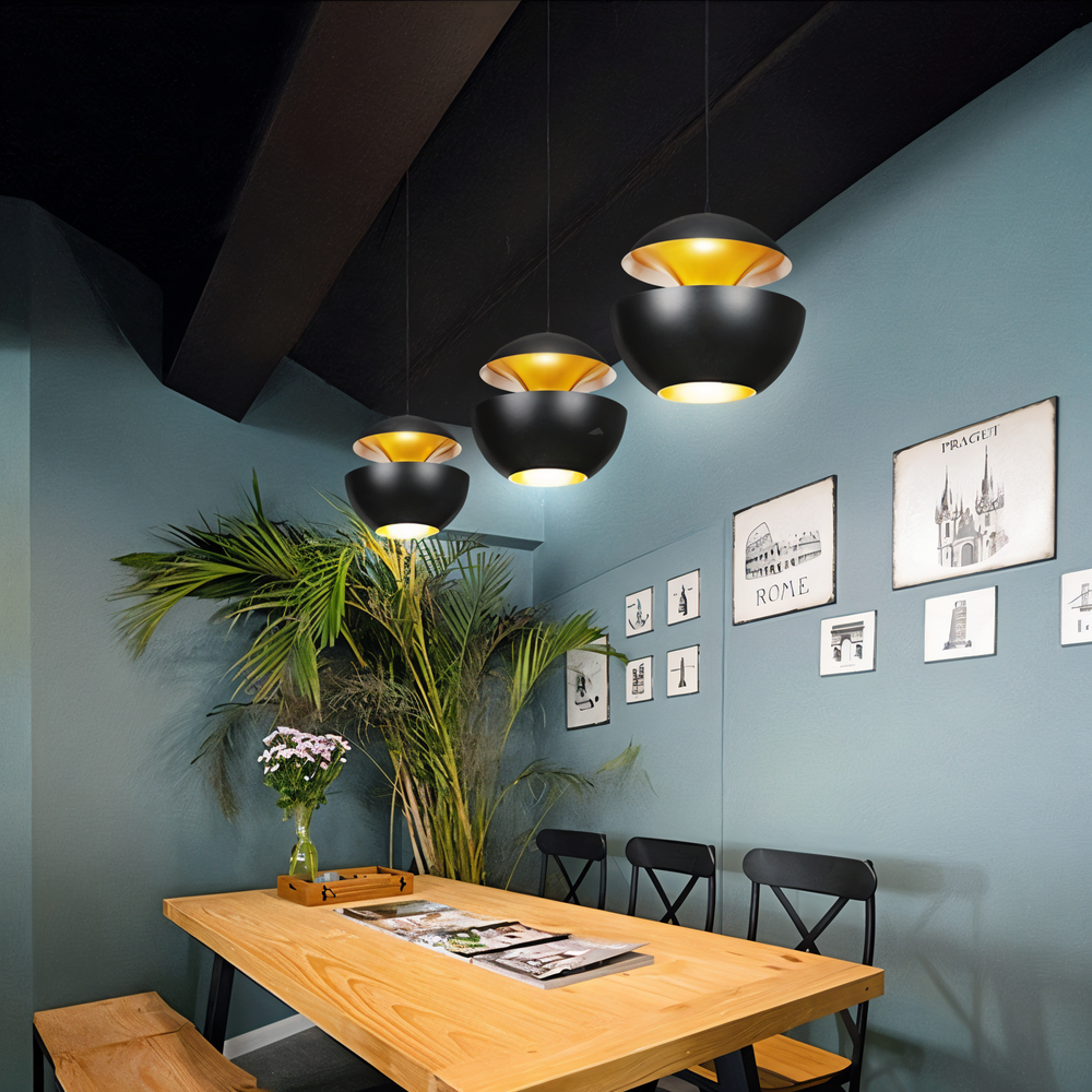 AppleGlow Pendant Light in black metal with glowing gold interiors, another view.