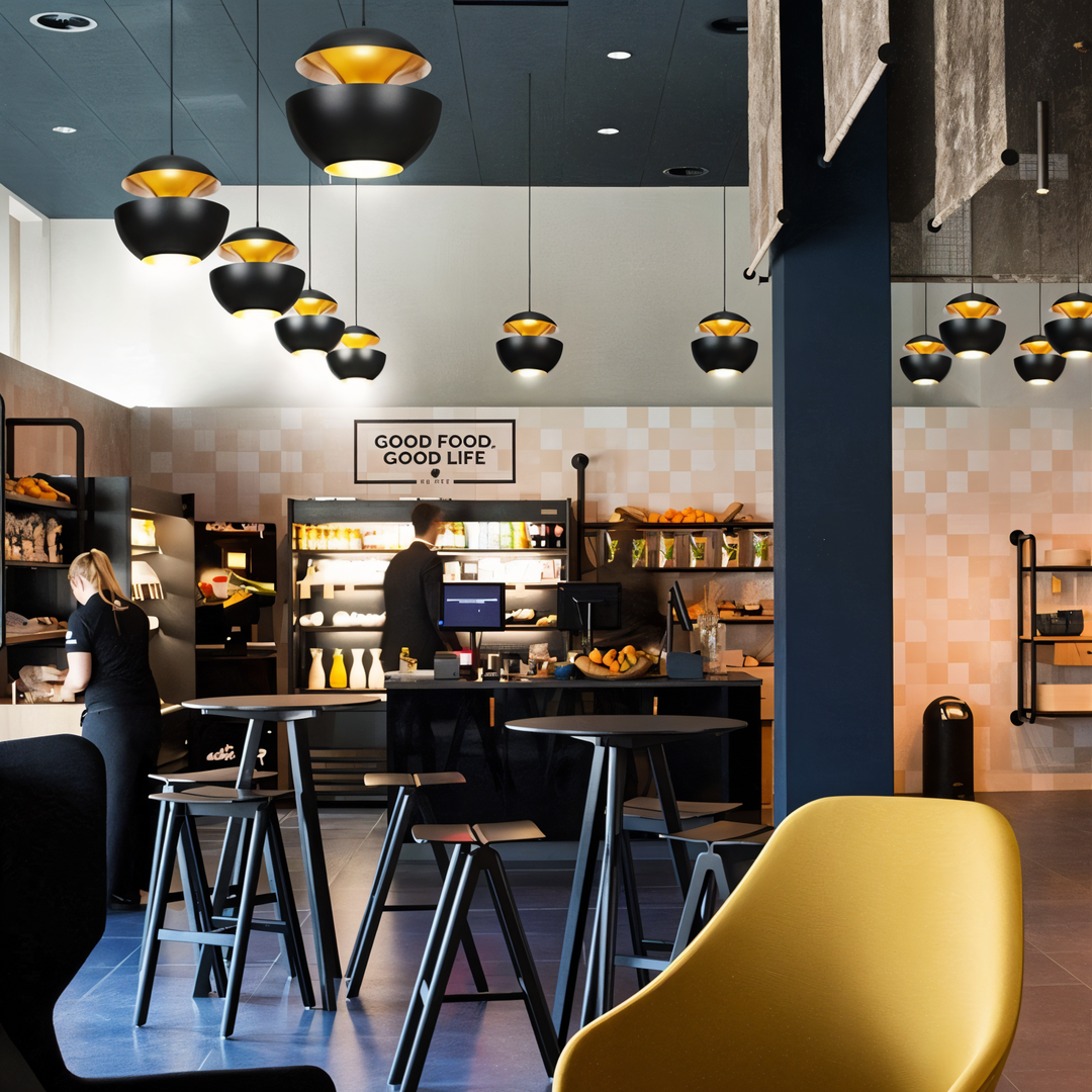 AppleGlow Pendant Light in black metal with gold interiors, another view.