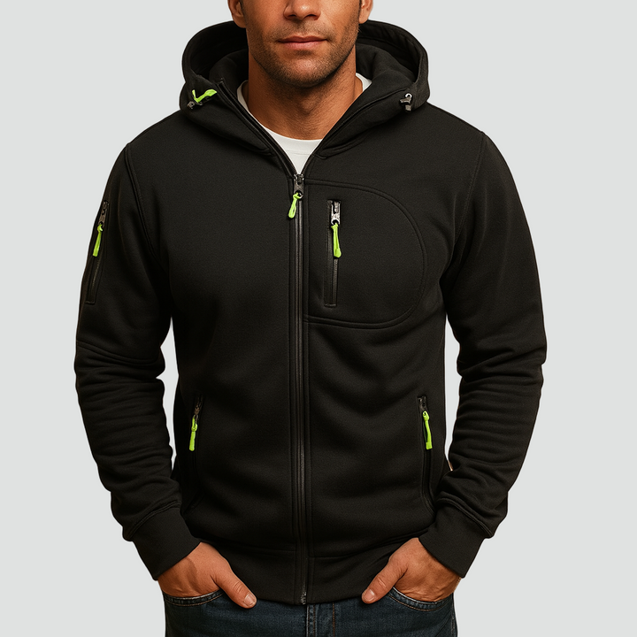 Men's black zip hoodie with lime green zipper pulls, a rounded chest pocket and sleeve pocket, detail.