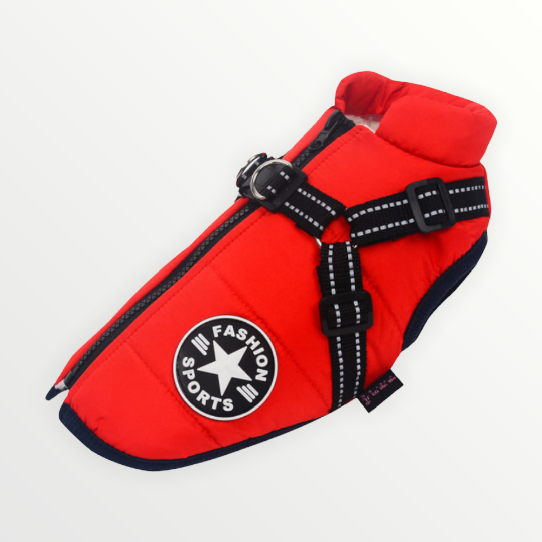 Red jacket with navy trim photographed flat from the side, showing the harness straps, chest patch, zipper and padded stand-up collar. 14