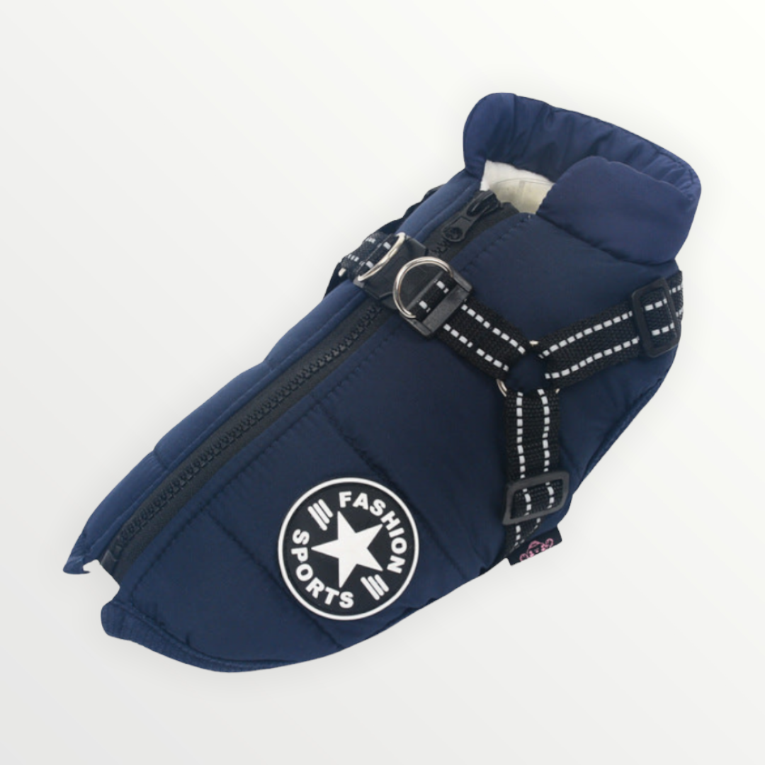 Navy blue jacket photographed flat, showing the back zipper, reflective harness straps with metal D-ring, chest patch and fleece-lined collar. 16