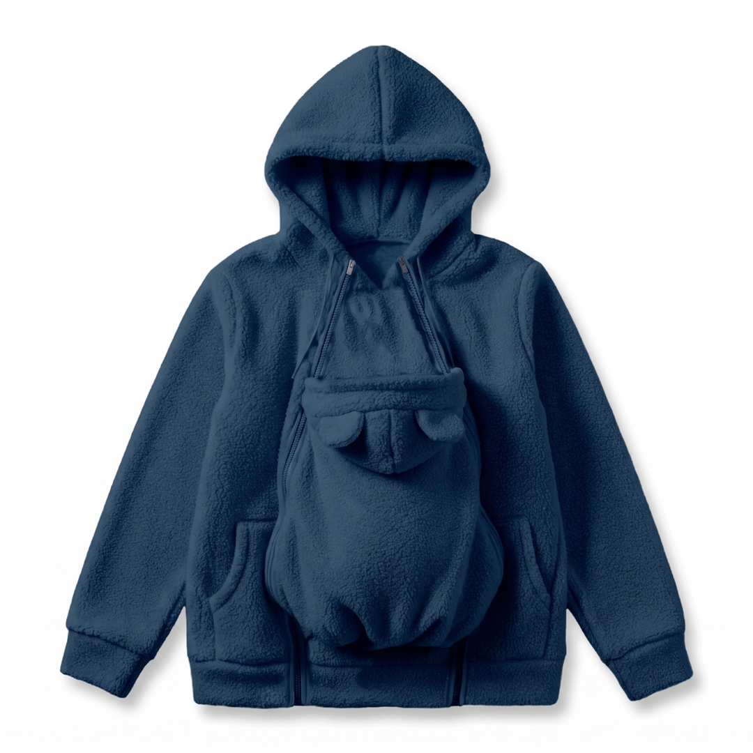 Navy blue sherpa fleece hoodie laid flat with the bear-eared zip-on carrier panel attached to the front.