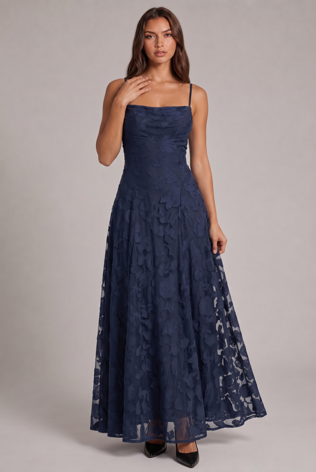 Olivia Maxi Dress in navy blue, front view with floral pattern and sheer hem