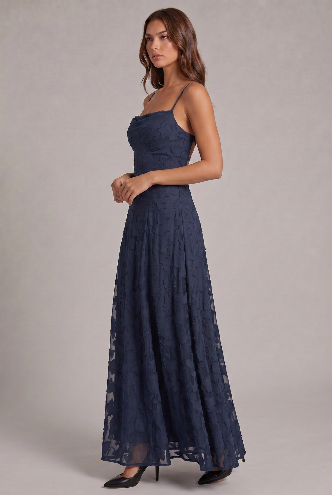 Olivia Maxi Dress in navy blue, side view with sheer flared skirt