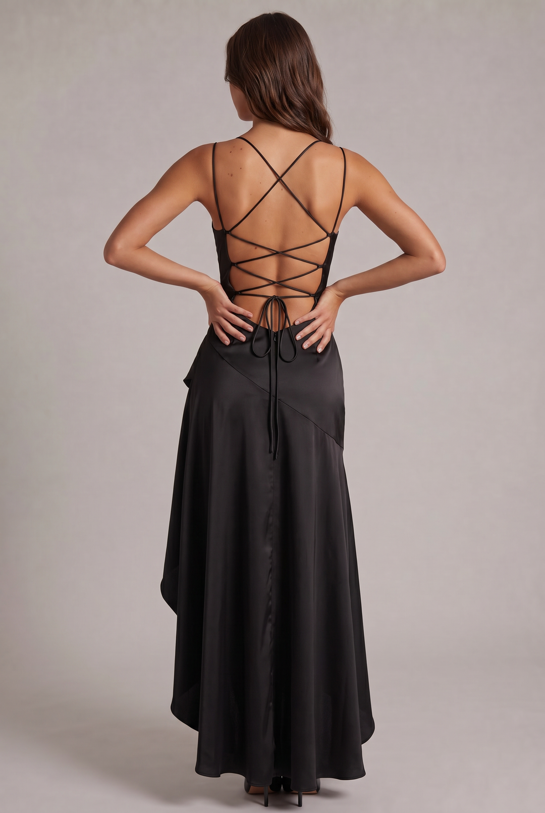 Back view of the black satin dress with crisscross lace-up open back and long tie ends 12