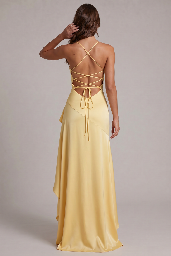 Back view of pale yellow dress with crisscross lace-up open back and dangling ties 32