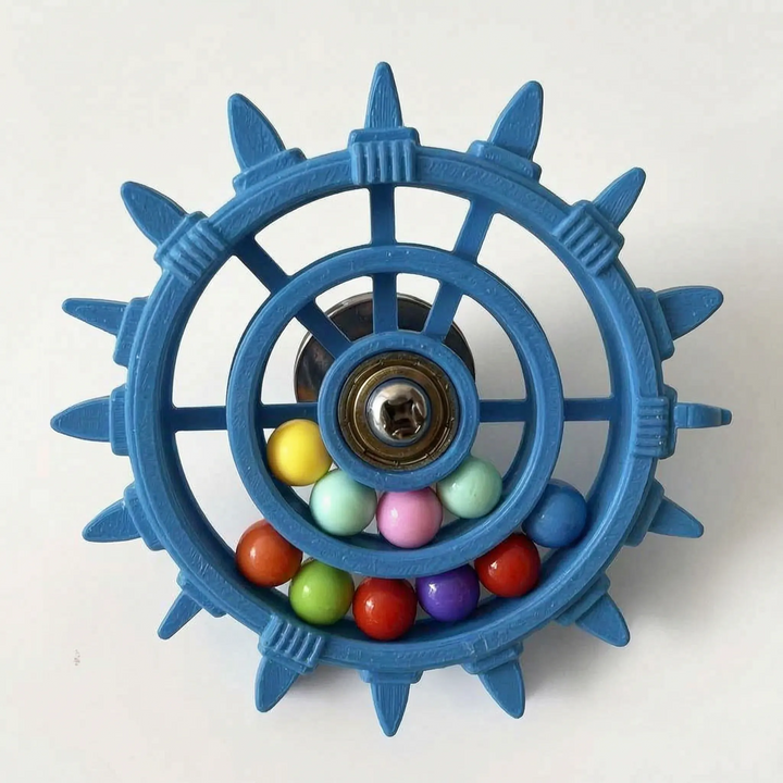 Blue version of the wheel toy with extra pointed spokes around the rim, a bearing center, and many multicolored beads. 8