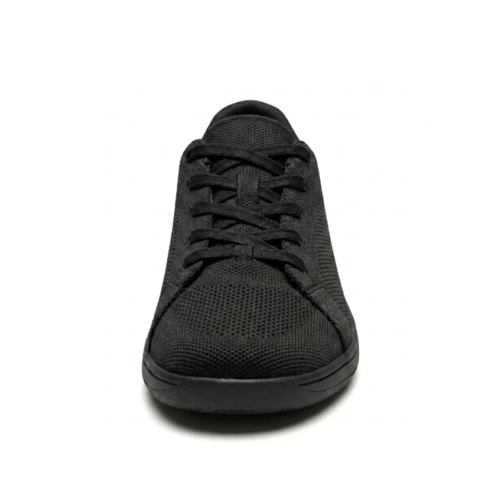 Front view of a black knit sneaker showing the criss-cross laces, rounded toe box and flat black sole.