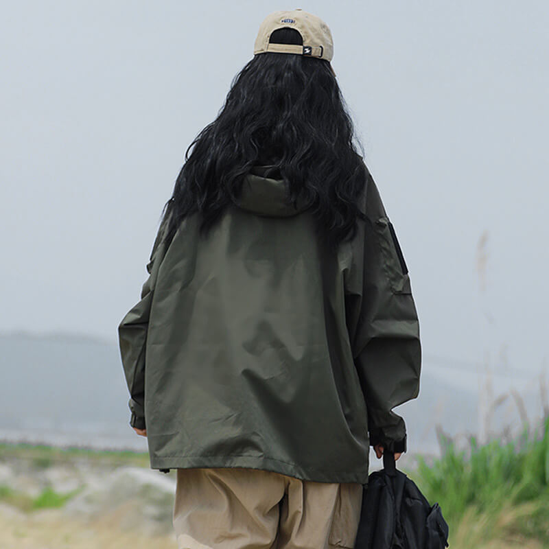 Olive green hooded jacket, back view.