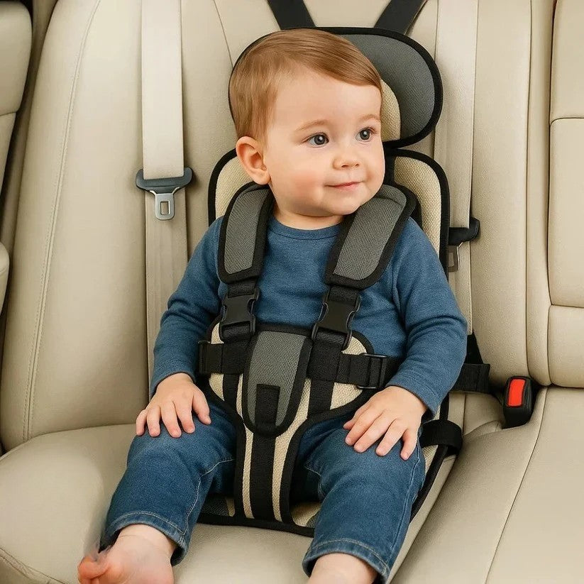 Blue foldable kids travel seat with harness, another view.