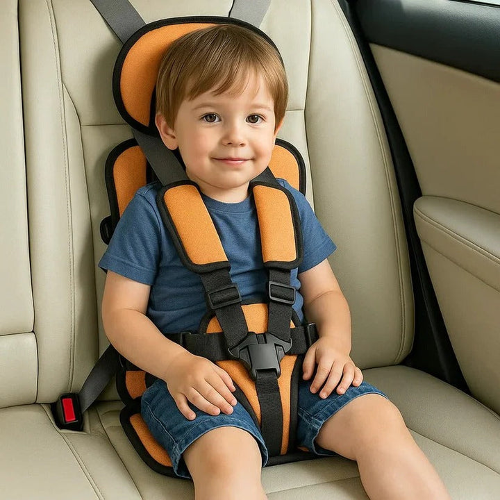 Blue foldable kids travel seat with harness, another view.