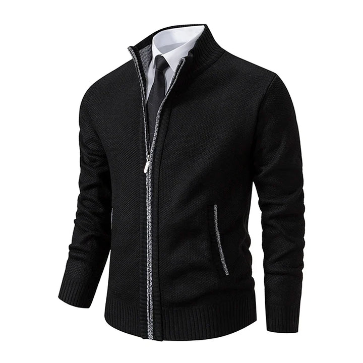 Angled view of the black knit zip cardigan with gray contrast trim along the zipper and pockets 31