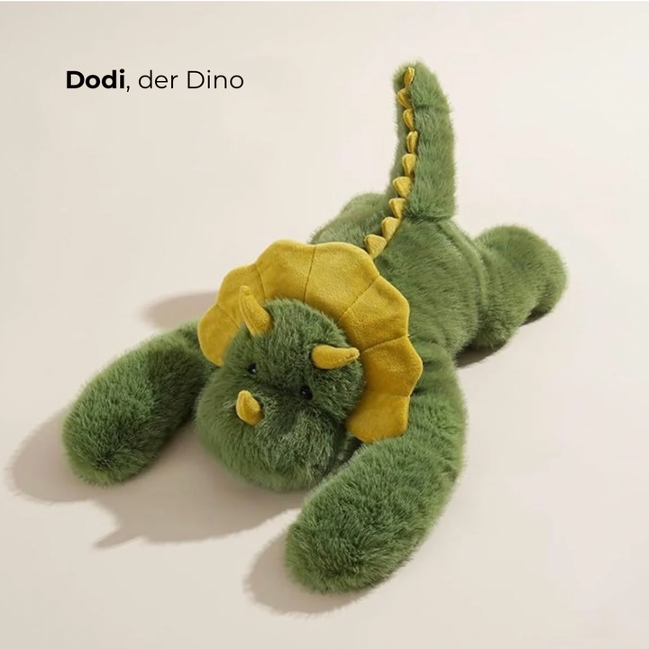 Green dinosaur plush with a yellow frill, small yellow horns and a spiked tail lying on its belly. 4