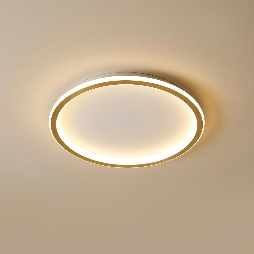 Round ceiling light with a gold-toned inner band and white outer edge, glowing warmly 5