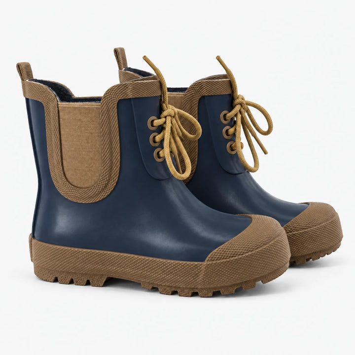 Pair of navy blue rubber rain boots with brown toe caps, elastic side panels, mustard laces and chunky treaded soles. 8