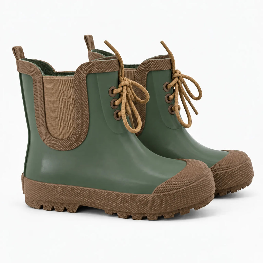 Pair of muted olive green rain boots with brown toe caps, elastic side panels, tan laces and chunky treaded soles on white. 9