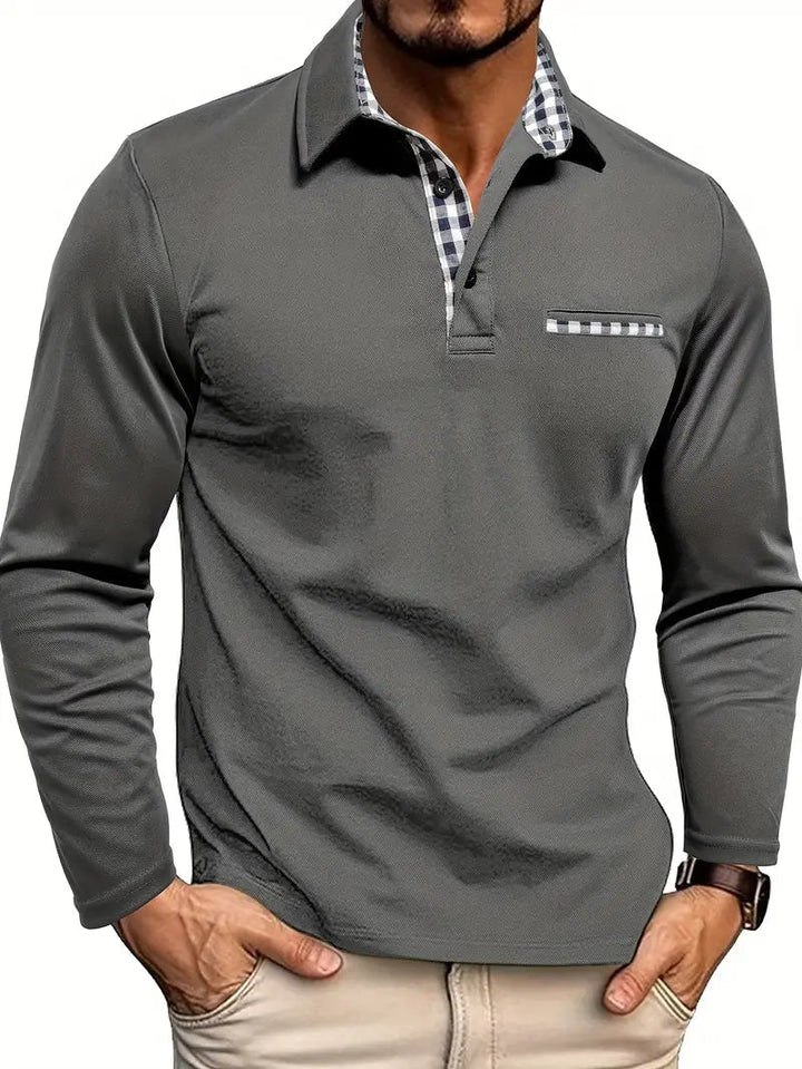Men's long sleeve polo shirt in charcoal gray with a gingham-lined collar, placket and chest pocket edge.