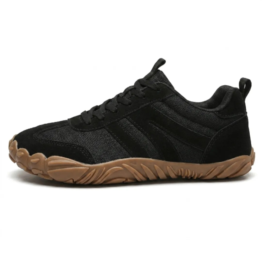 Lilia Women's Barefoot Shoes in black, side view with black laces and tan rubber sole.