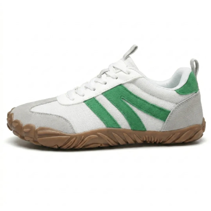 Side view of the white sneaker with green suede stripes, light gray toe and heel overlays, laces and a tan gum sole. 28