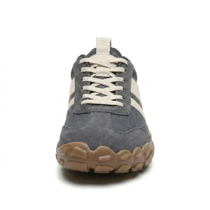 Lilia Women's Barefoot Shoes in gray, front view with crisscross laces and wide rounded tan sole.
