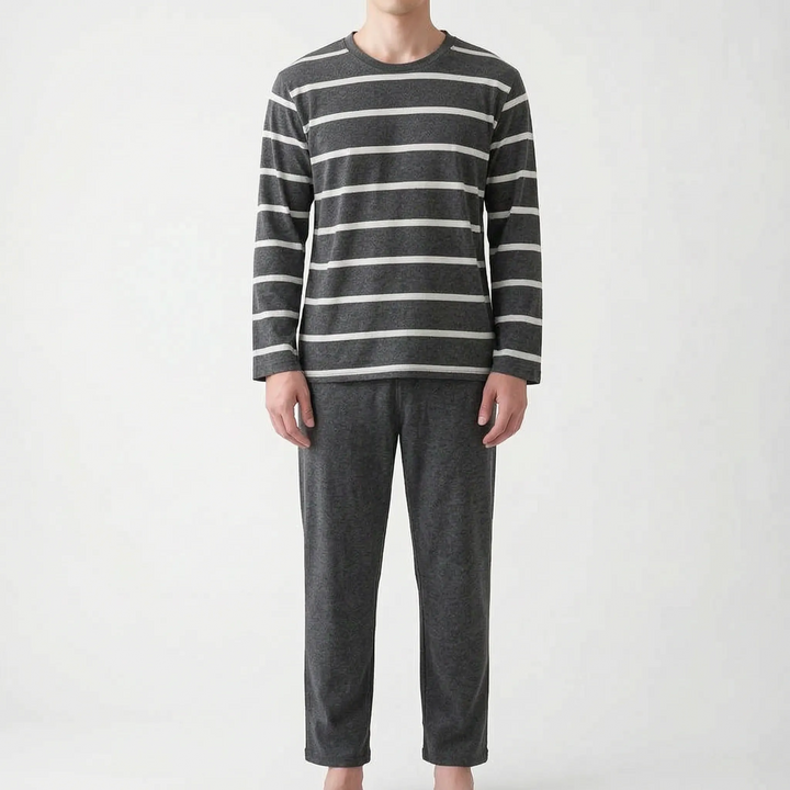 Model wearing a darker charcoal version of the striped long-sleeved top with white stripes and matching charcoal pants. 8